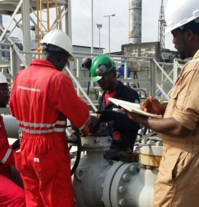 Oil Pipeline Engineers testing the pressure of an oil pipeline